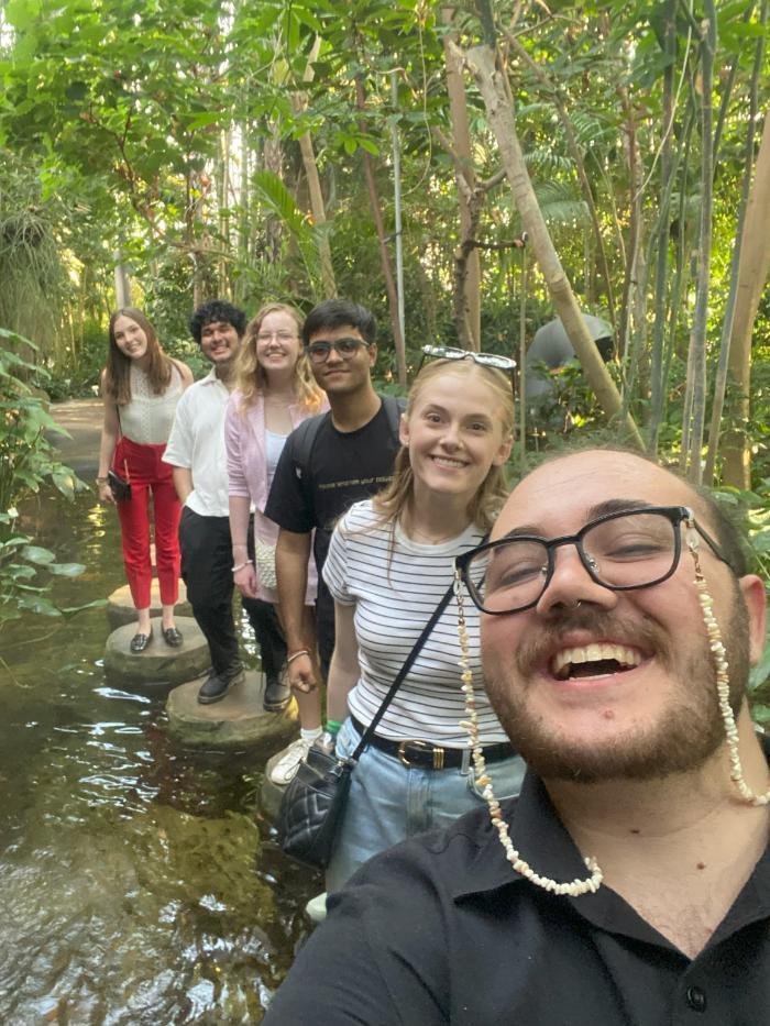 A group of students in a botanical garden.